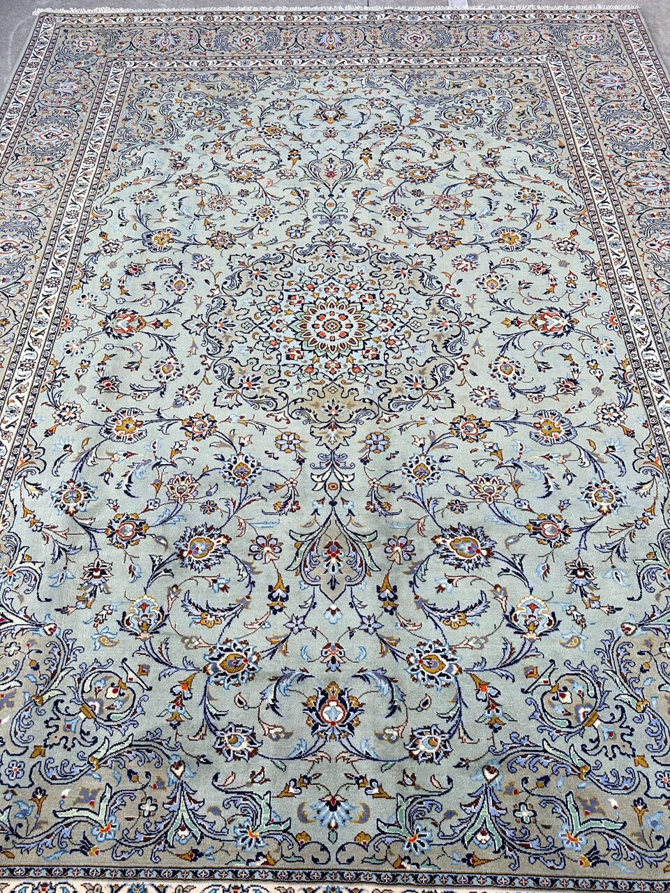 green kashan rug