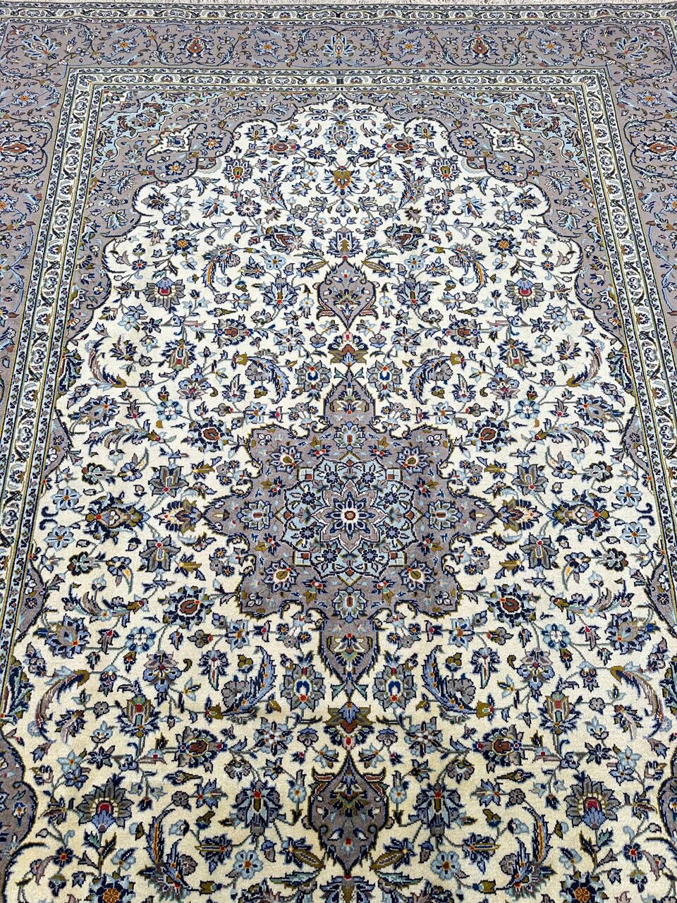 beige kashan rug