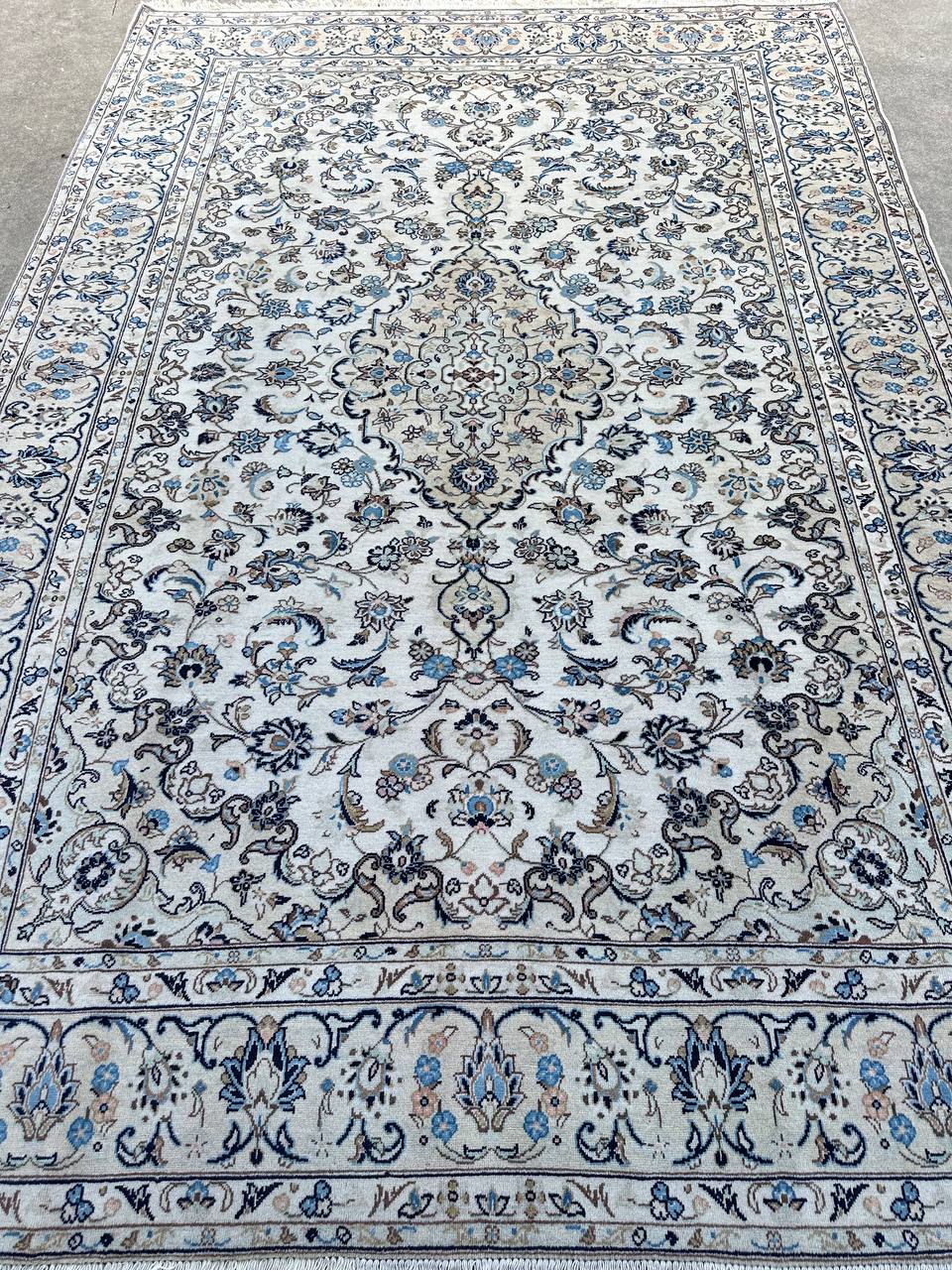 beige kashan rug